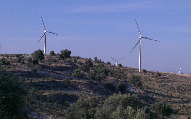 wind turbines on mountain slope